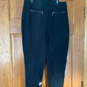 Size large black leggings. Faux pockets in front